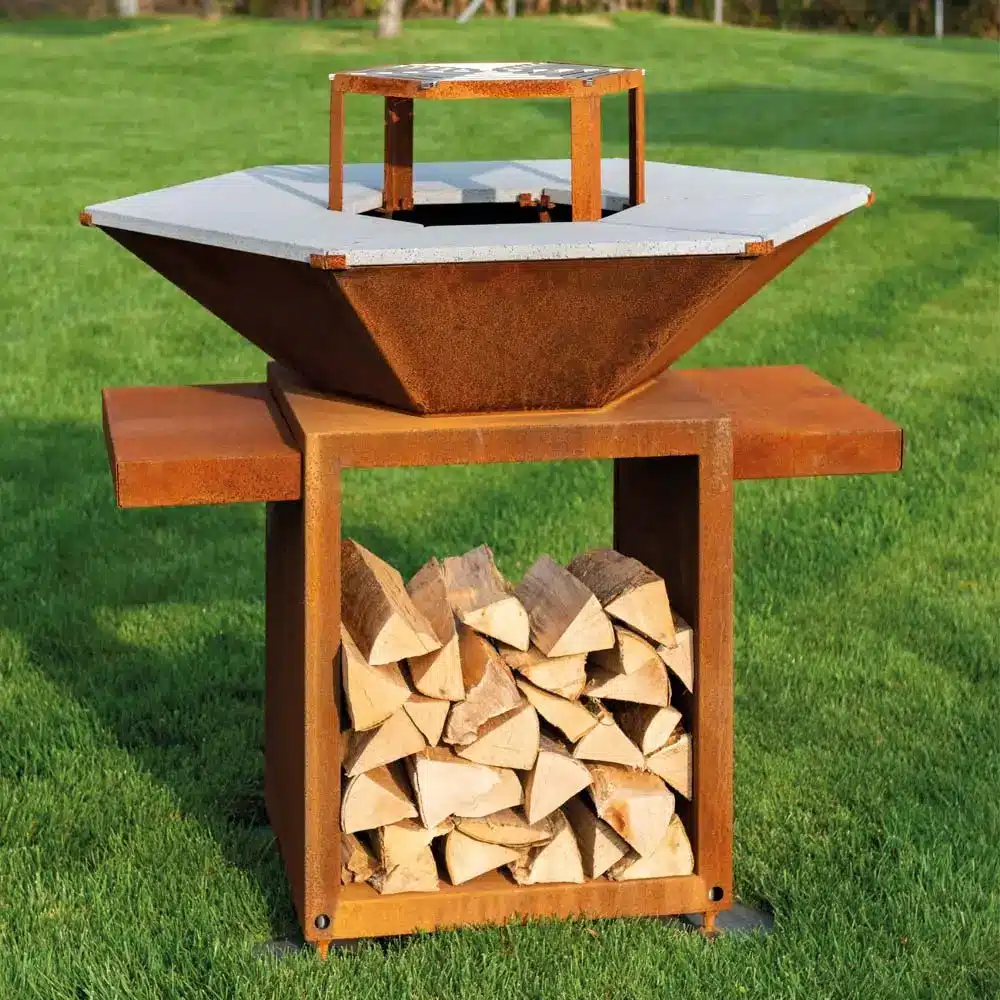 Braciere in corten con piano cottura e legnaia